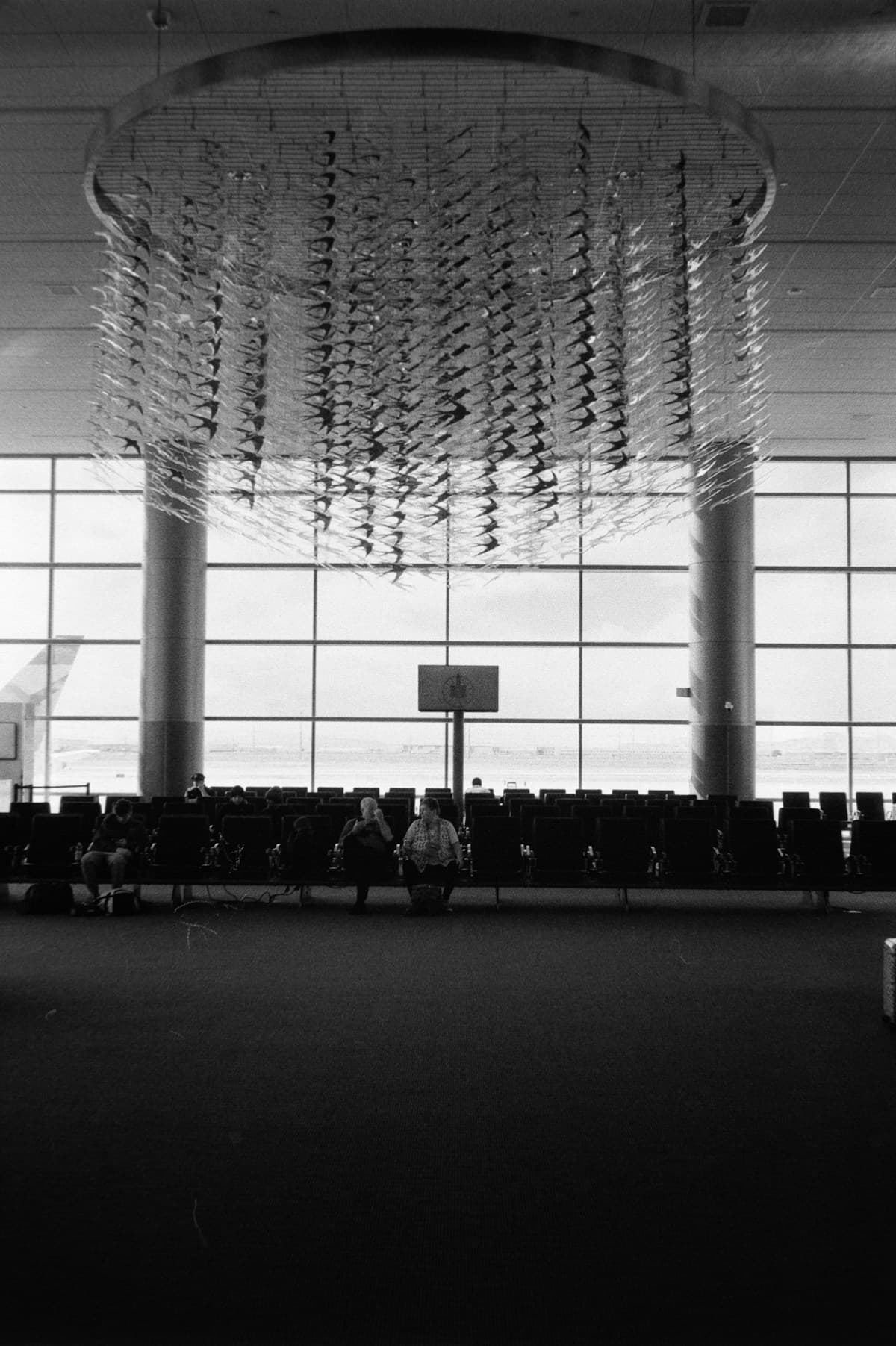 Passengers waiting in an airport terminal